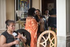 Two women talking at a event